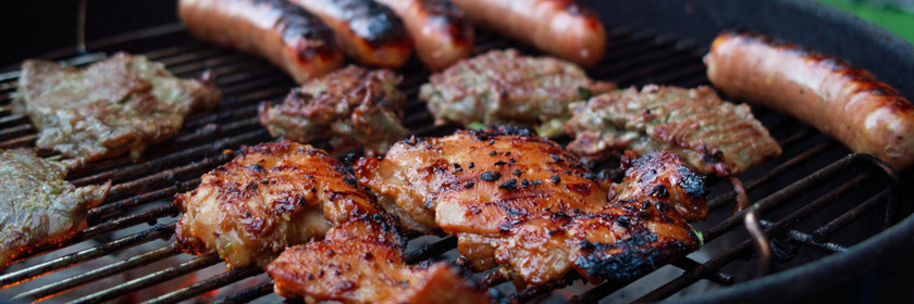 Photograph of food on a barbeque