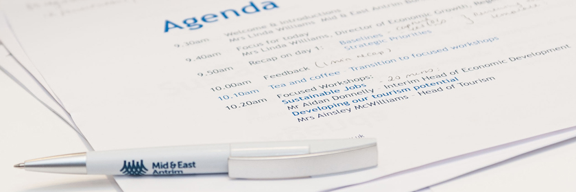 Photograph of an Agenda for a Community Planning event