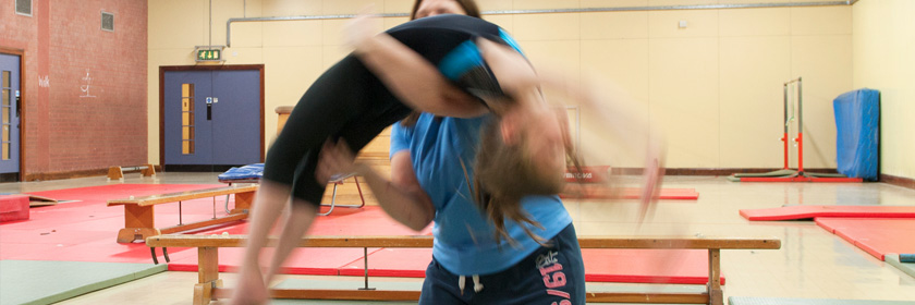Photograph of a girl doing gymnastics