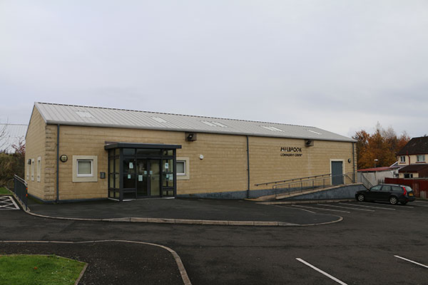 An external view of Millbrook Community Centre showing the ground level, accessible entrance.