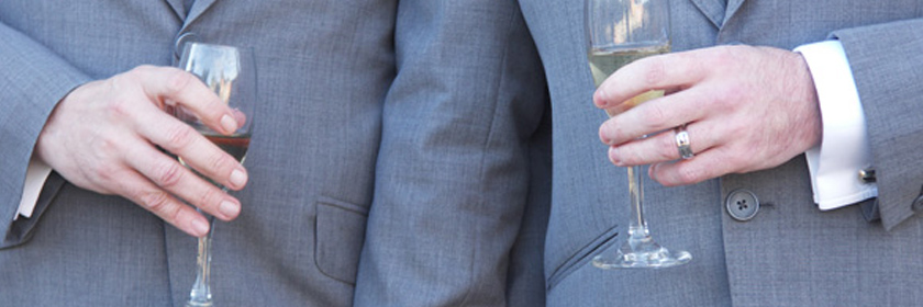 Photograph of two people at a wedding