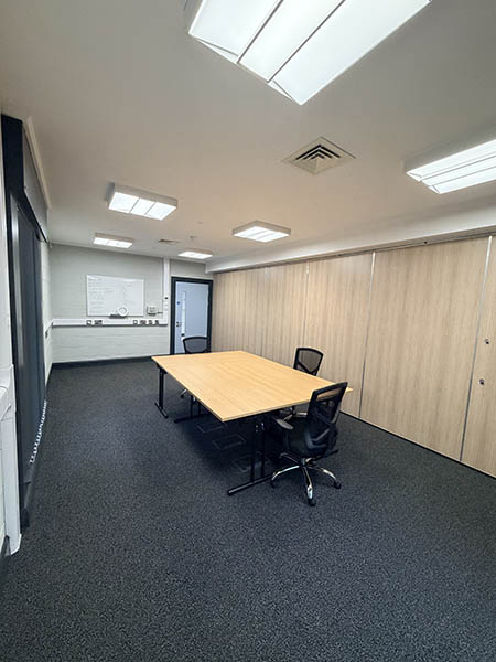 A view of the large meeting room at Waveney Community Centre showing the other meeting room or office when split in two.