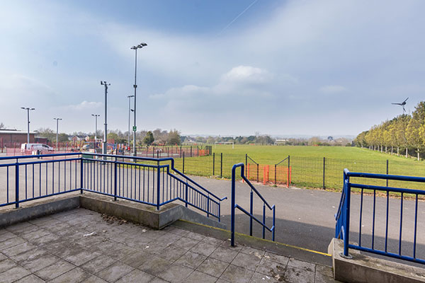 Rear access from Ballykeel Community Centre towards pitches.