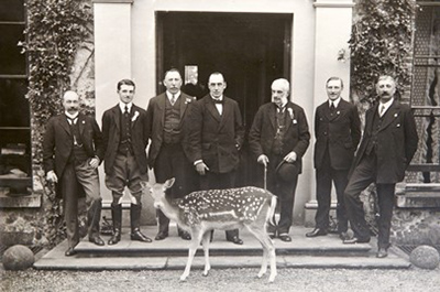 Galgorm Castle, on a visit to Ballymena to inspect the UVF, Sir Edward Carson and James Craig are guests of John Young.