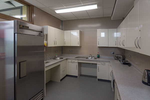 A view of the large counter-top and fridge in the kitchen at Harryville Community Centre.