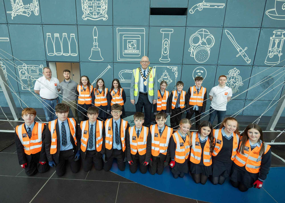 Mayor of Mid and East Antrim, Councillor Jackson Minford pictured with a group of students participating in the Activate Your Curiosity Event