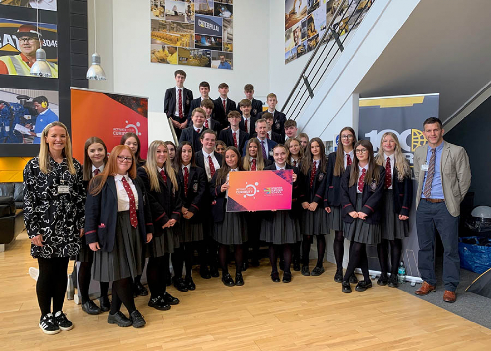Carrickfergus Grammar pupils photographed during their visit to Caterpillar