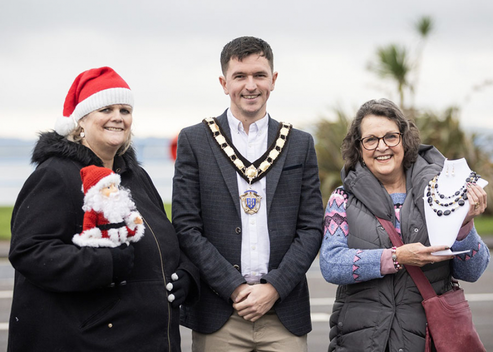 Cherryl Graham who runs ‘Made by Cherrybee’ (left) with Deputy Mayor of Mid and East Antrim Councillor Tyler Hoey and Stephanie Cheshire from ‘B'Jewelled Beads’ (right).