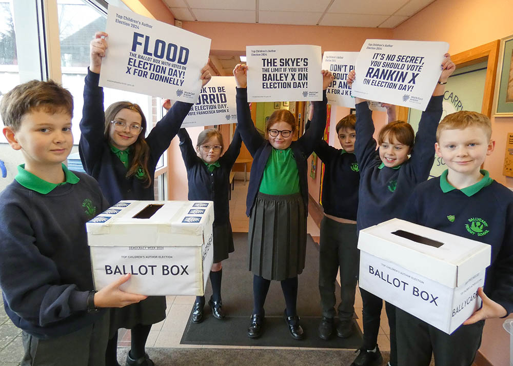 Pupils from Ballycarry Primary School lobby an undecided voter in advance of the Top Children’s Author elections. The school is one of 14 taking part in the Democracy Week initiative across the Borough.
