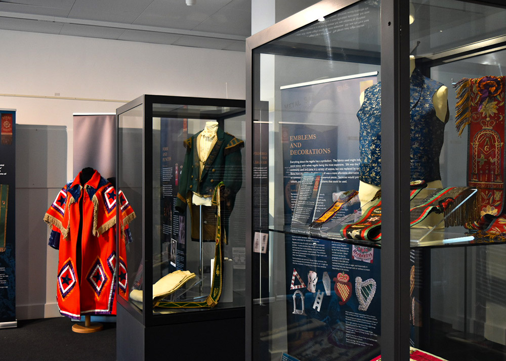 ‘Bound By Threads’ is the work of Ulster University Phd Researcher and Museum staff member, Helen Johnston.  The exhibition explores the design history of society regalia, the meanings bound into these pieces of clothing and the ways in which objects