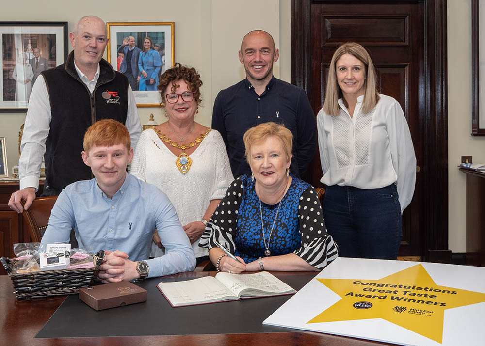 Seated: Jake Houston and Rhonda Houston from Granny Shaw’s Fudge Factory; Nigel Logan from Hillstown Farm shop; Mayor, Alderman Gerardine Mulvenna; Adrian and Angela Patterson from Gold & Browne’s.