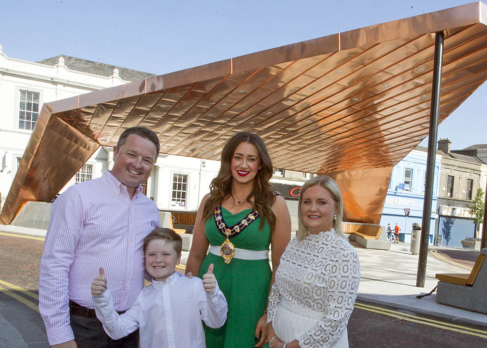 Euan Francis-Naylor with mum and dad, Michelle and Michael, and the Mayor of Mid and East Antrim, Councillor Lindsay Millar