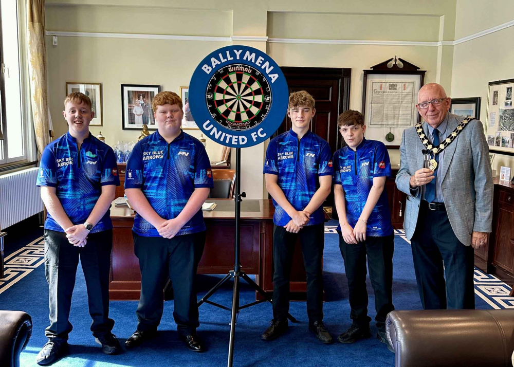 Mayor of Mid and East Antrim, Cllr Jackson Mindford with the Four Ballymena Youth Darts Players