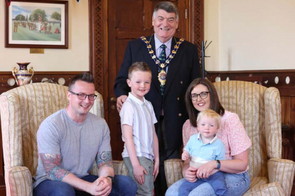 Mayor meets inspiring schoolboy Lewis Rennie image