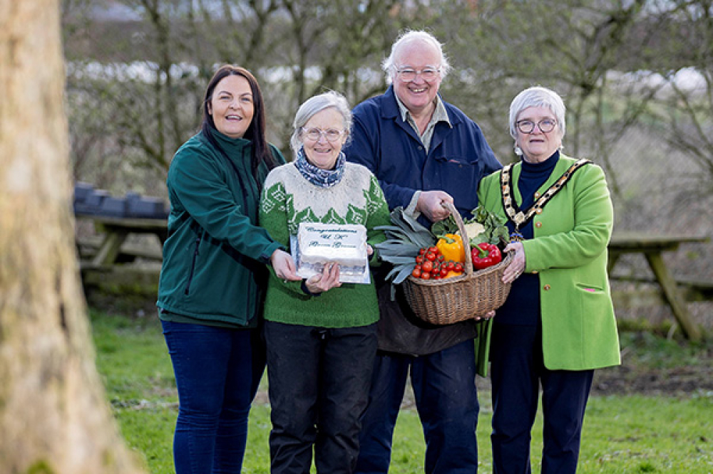 Pictured from (L-R) Carly Ogilvie MEA Council Sustainable Food Coordinator, Linda McCooke, Frank McCooke and Deputy Mayor, Councillor Beth Adger MBE.