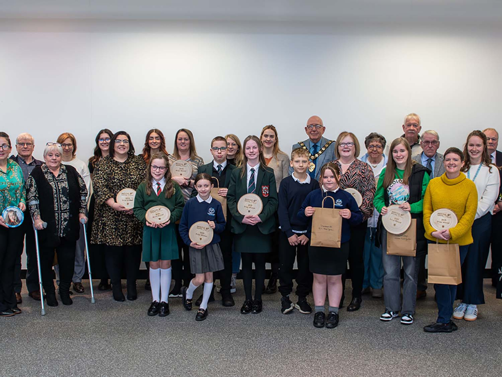 Mayor of Mid and East Antrim, Councillor Jackson Minford, with MEA in Bloom award winners.