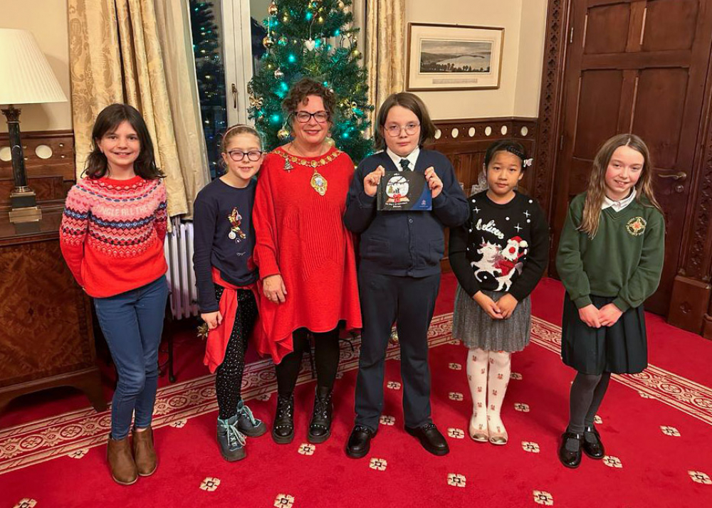 Mayor, Alderman Gerardine Mulvenna, pictured along with the winner and runners-up of the Mayor's Christmas card competition