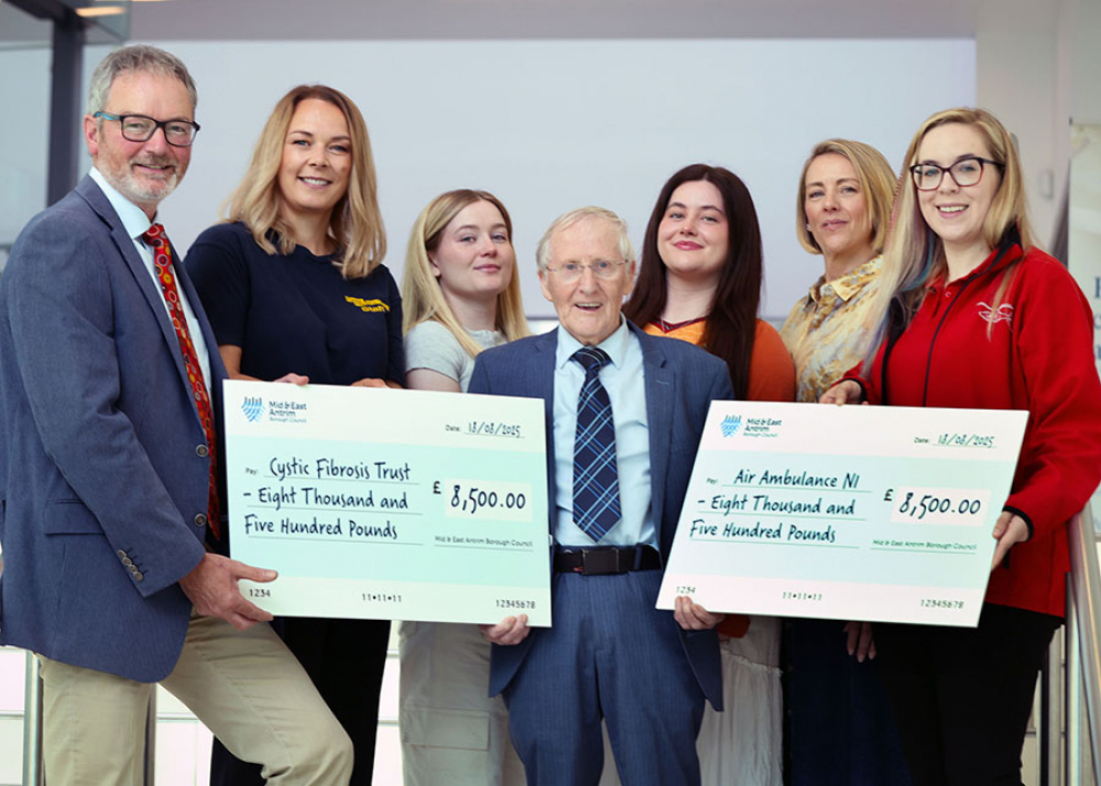 Alderman William McCaughey with representatives from the Cystic Fibrosis Trust, Air Ambulance NI and Alderman Beth Adger MBE’s family – including husband Tommy, daughter and granddaughters.