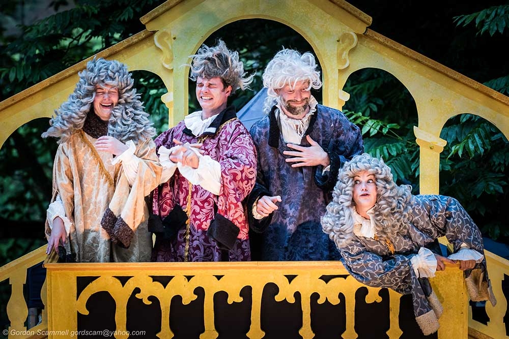 A performance of The Merchant of Venice by Illyria Theatre at Trebah Garden Amphitheatre in Cornwall.