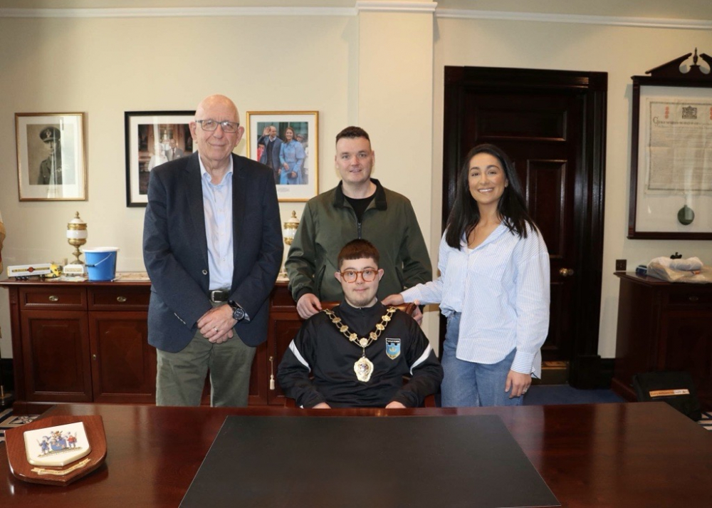 Mayor of Mid and East Antrim, Councillor Jackson Minford pictured with Darren Tweed, wife Amber, and son Jack at Mayoral reception.