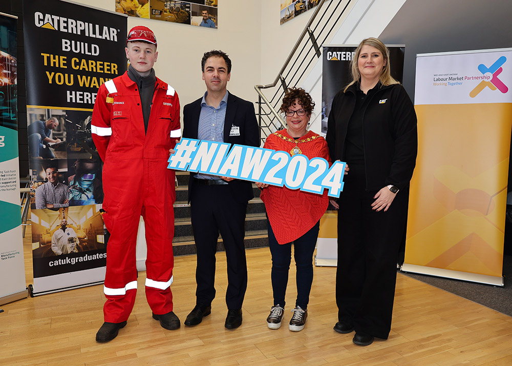 Featured from L-R: Caterpillar, Mark McDonnell, Maintenance Apprentice at the Caterpillar Larne site; Clement Athanasiou, Director of Apprenticeships, Careers and Vocational Education, Department for Education; Mayor of Mid & East Antrim, Alderman Gerardi