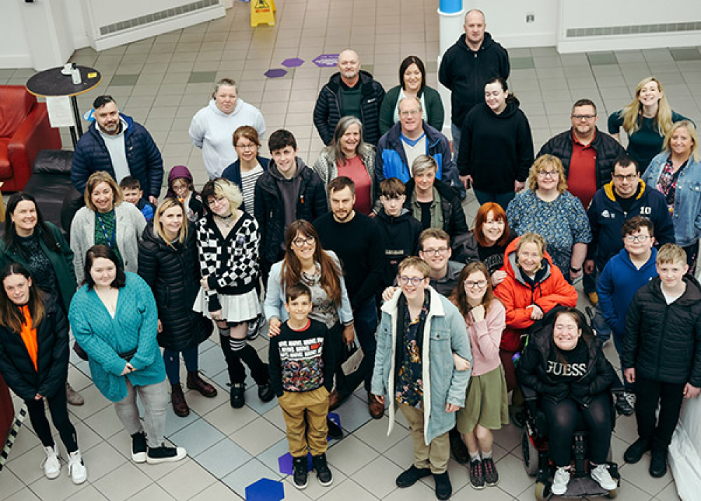 participants attending the launch of the exhibition