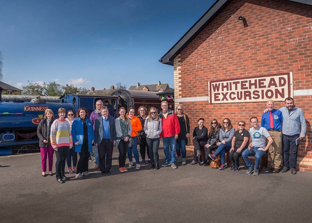 Top international tour operators have been enjoying an action-packed tour of Northern Ireland. They are pictured visiting Whitehead Railway Museum with Sinead Murray, Tourism Ireland (second left) and Conor Owens, tour guide (right). Pic by Chris Neely (