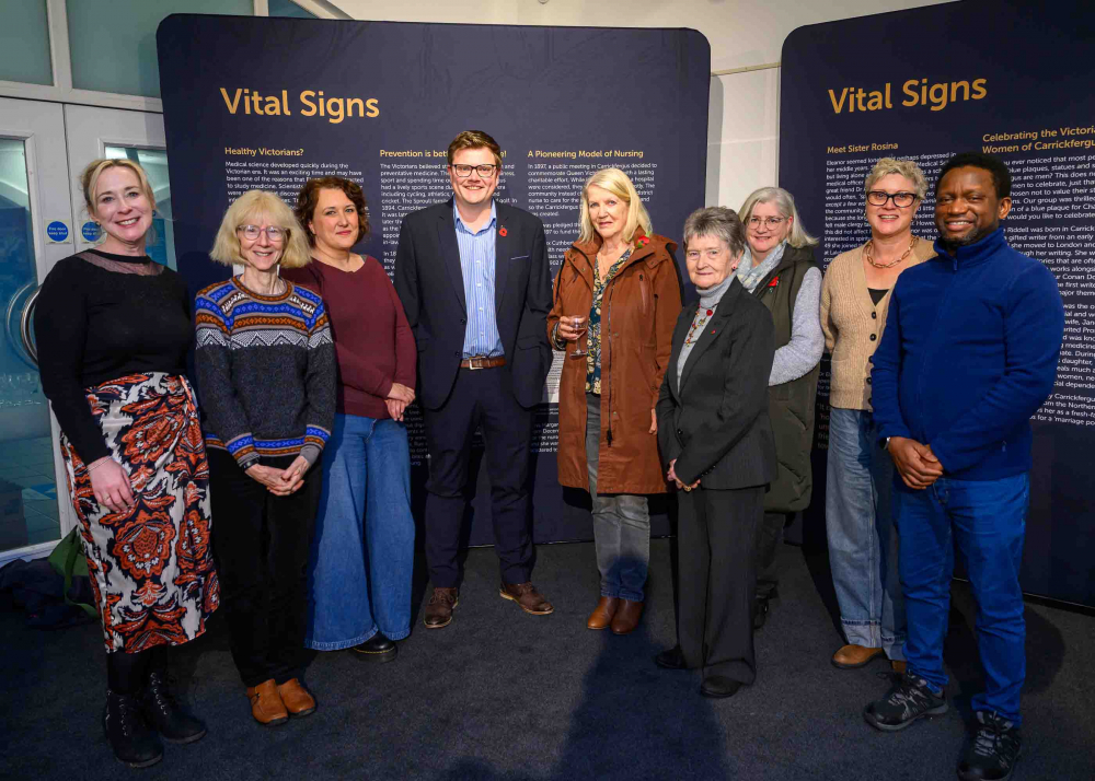 Cllr Aaron Skinner with Project Co-ordinator Lisa Rea Currie, Heritage Officer Shirin Murphy and other project participants launching new exhibition at Carrickfergus Museum
