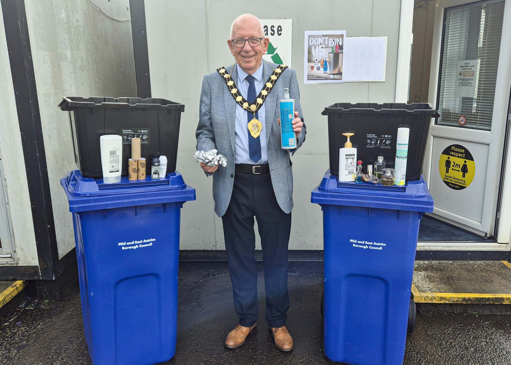 Mayor of Mid and East Antrim, Councillor Jackson Minford, is encouraging Borough residents to play their part in recycling and is pictured with recycling bins and items of rubbish often overlooked for recycling including shampoo bottles and foil.