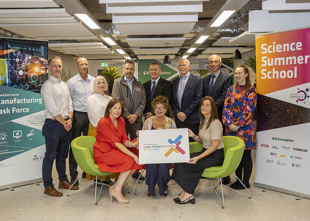 All sponsors: Seated L-R: Caroline Rowley, Kilwaughter Minerals; Mayor; Fiona Byrne, Kilwaughter Minerals  Standing L-R: Chris Gault, Caterpillar; William Nelson, Wright Bus; Tracy Mearns, Yelo; Graeme Bennett, IPC Mouldings; Graham Whitehurst, Chair of t