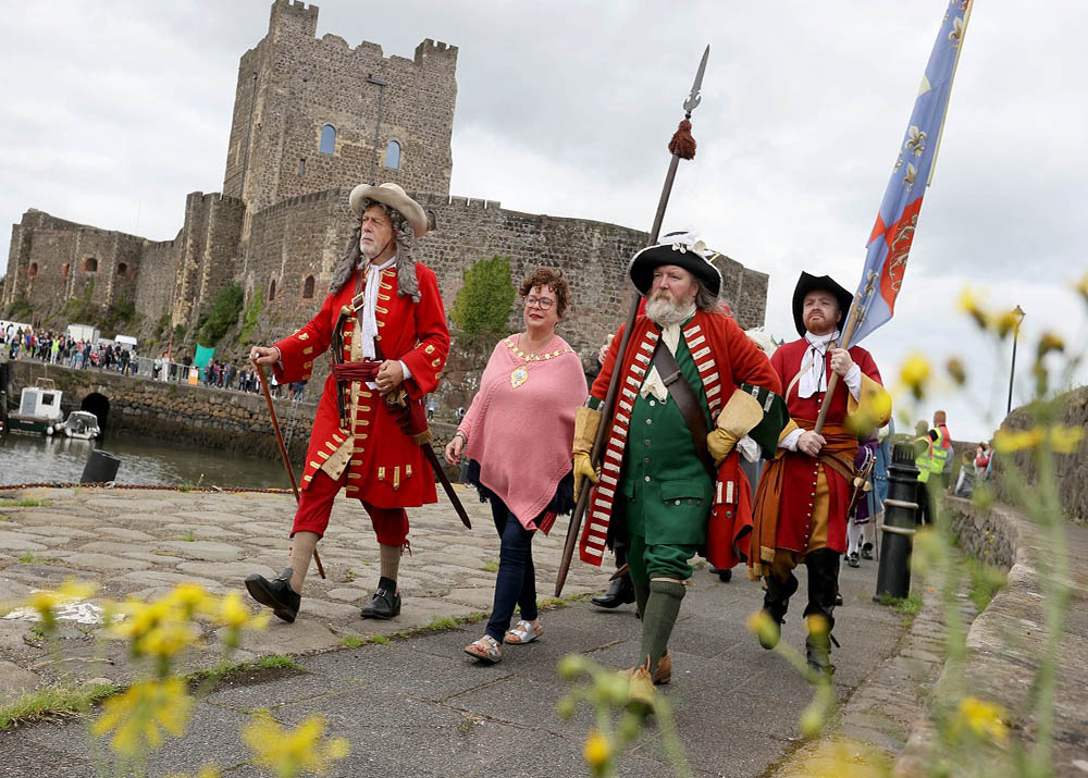 Mayor, Alderman Mulvenna, along with those reenacting the landing of King William the 3rd