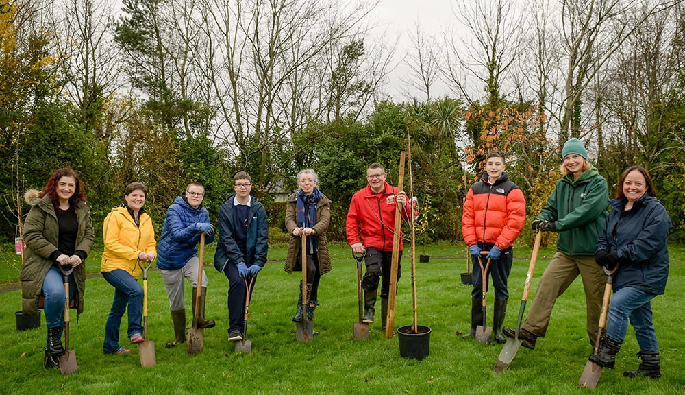 Volunteers from Larne Area Support Group, pupils from Roddensvale School with teacher and Cllr Donnelly, Gary Bissett, Inver Garden Centre, Marlene Gattineau and Vanessa Postle, Parks and Open Spaces pictured planting the Community Orchard in Larne Town P