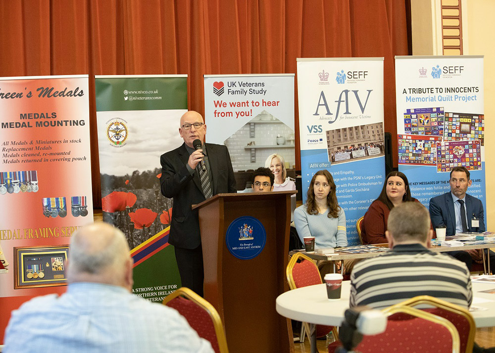 Alderman Ashe speaking at the Vetern's Roadshow event in Carrickfergus.