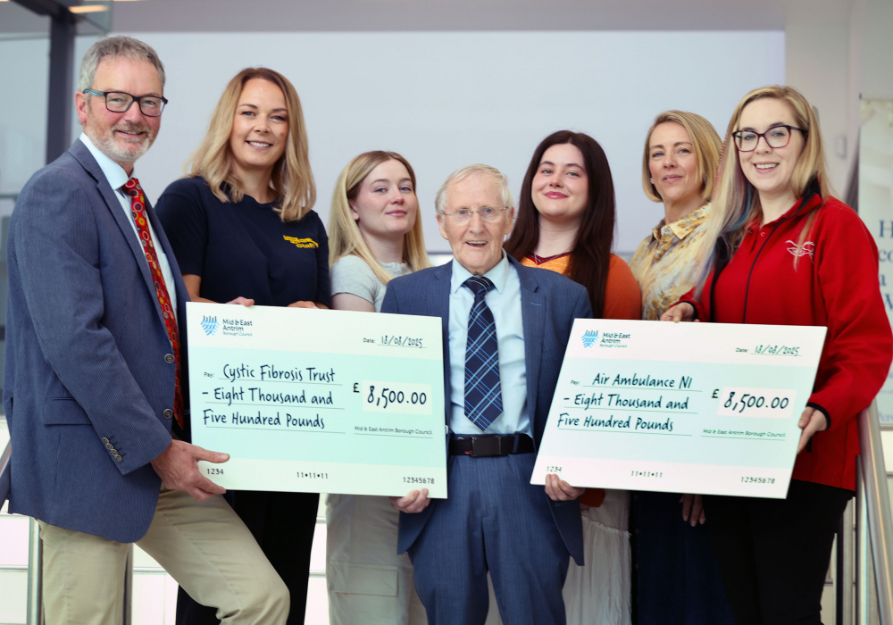 Alderman William McCaughey with representatives from the Cystic Fibrosis Trust, Air Ambulance NI and Alderman Beth Adger MBE’s family – including husband Tommy, daughter and granddaughters.